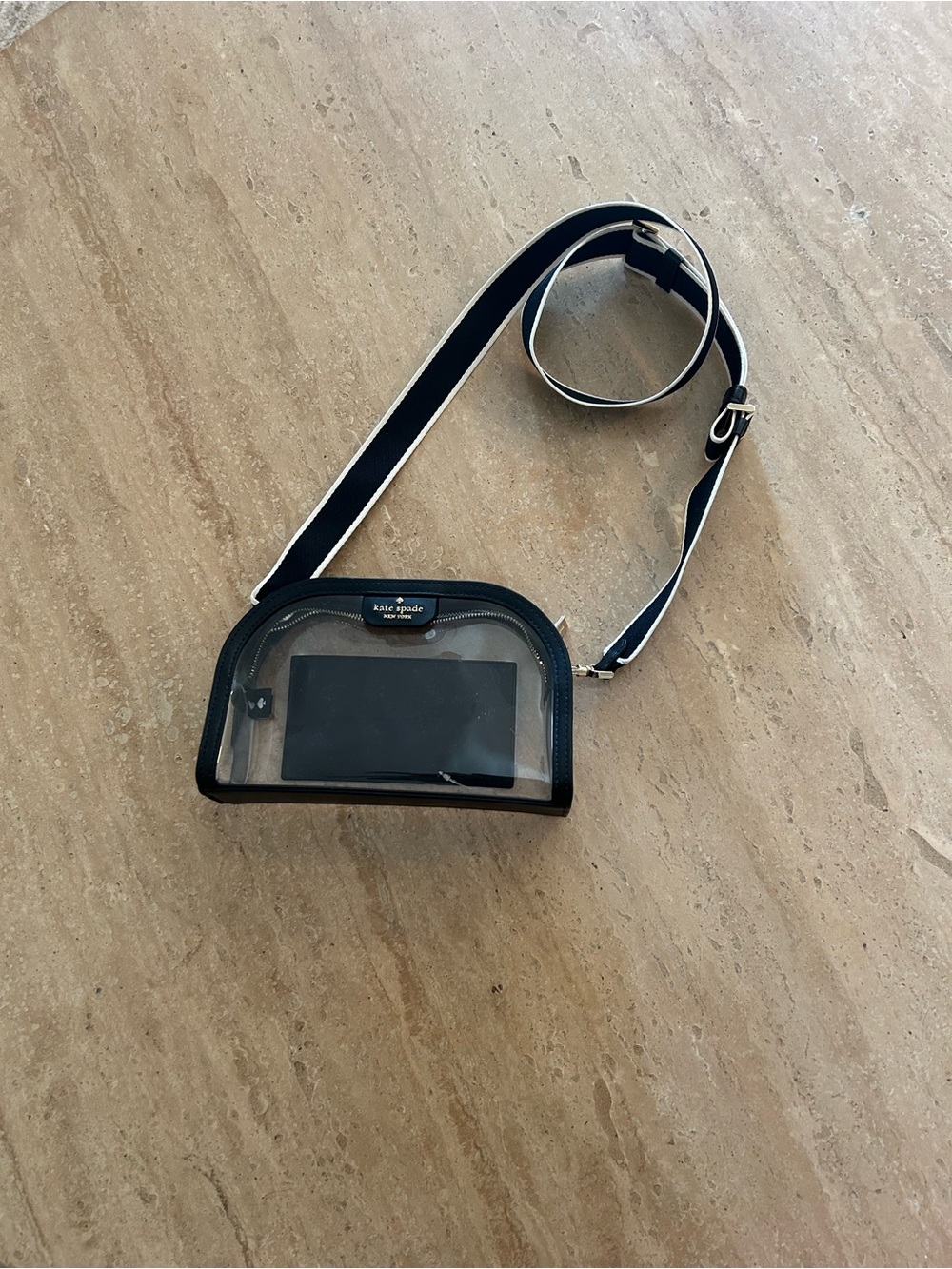 Kate Spade clear crossbody with black and white striped strap